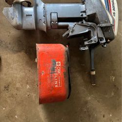 Evinrude 9.9 outboard motor with gas tank.