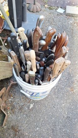 BUCKET FULL OF KNIVES