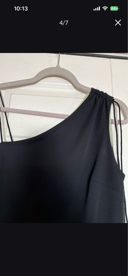 It’s very cute Dress from express the size is11-12 the color is Black and light green