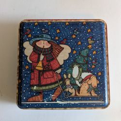 Tin Christmas Caroler Angel With Sled And Pets 6 1/4 x 6 1/4 Km