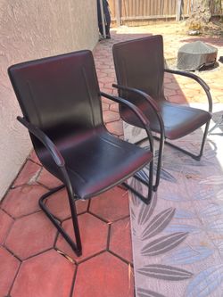 Pair of Black Faux Leather Guest / Conference Chairs