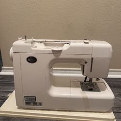 Kenmore sewing machine with thread