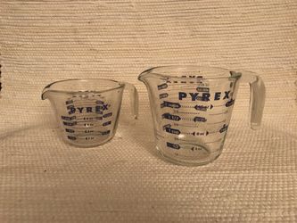 Two vintage glass PYREX measuring glasses cups