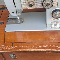 Sewing Machine In Cabinet Only $20