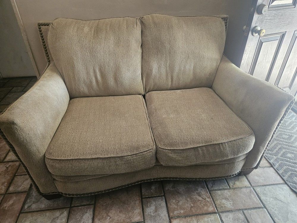 A Three Piece And Love Seat Furniture
