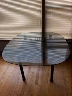 Glass top dining table