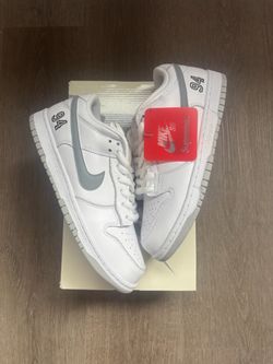 Supreme X Nike Dunk Low SB “White Metallic Silver”