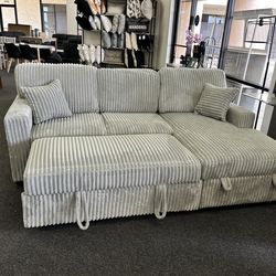 Sleeper sofa with reversible storage chaise, cupholders and USB port