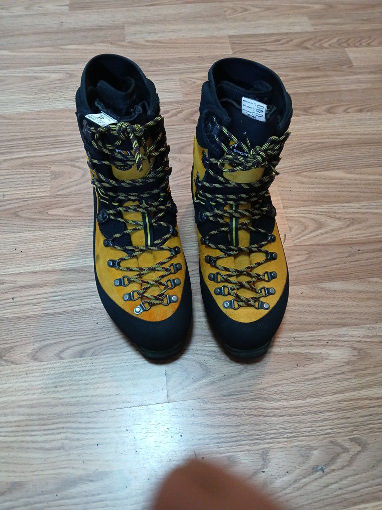La Sportiva mountain boots size 12.5 clean inside and out ready to give them work 95 percent of life.