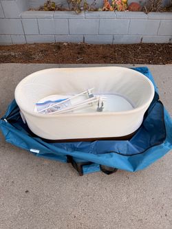 SNOO Bassinet with bag, legs, and swaddle accessories