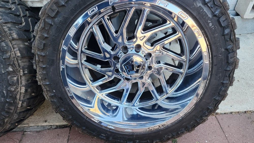 22" TIS WHEELS 22X12.5 ON 35 TIRES MAKE OFFER