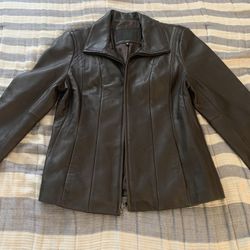 Woman’s Size L Large Leather Jacket.  Few Marks/scuffs. Plenty Of Life Left In It. 