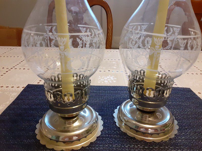  A PAIR OF REALLY NICE LOOKING CANDLE HOLDERS  THE  GLOBES ARE  VERY NEAT LOOKING 