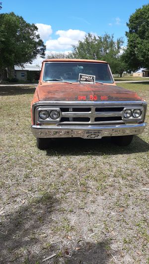 Photo 1969 GMC custom camper 3/4 ton, project truck, I think it spun a rod bearing. Solid body, no bondo. only surface rust.
