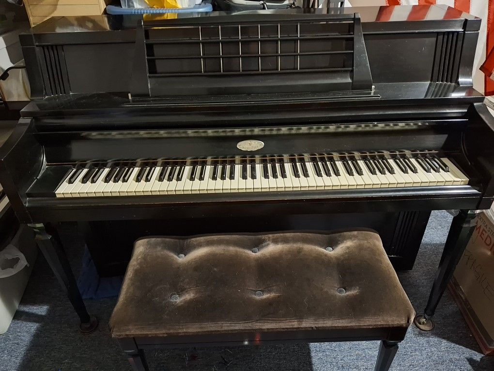 Black Upright Wurlitzer Piano