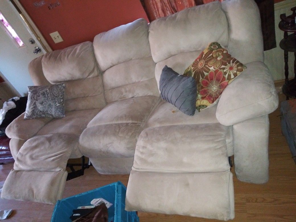 Nice sectional fully reclining loveseat and couch leather