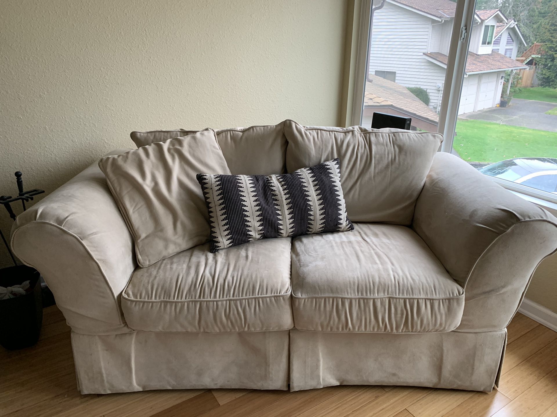 beige loveseat and couch