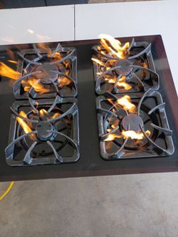 GE, Gas Stove.  30" inches long size     21"1/2 inches Short size