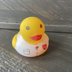 NEW - Nurse Duck for Jeep, bath, work - Squeaks 