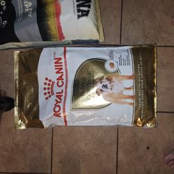 Various Bags Of Dog Food 