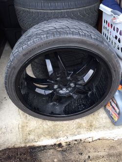 22' black rims with tires