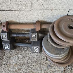 Weight plates and dumbelss todo por 50.00