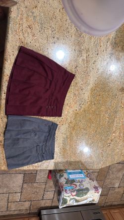 Gray skirt and maroon skirt