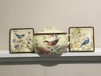 Decorative soup urn and wall hanging.