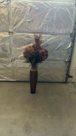 Beautiful copper vase With Floral Arrangement