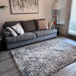 Grey Sofa And rug 