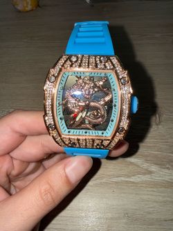 Iced out blue watch