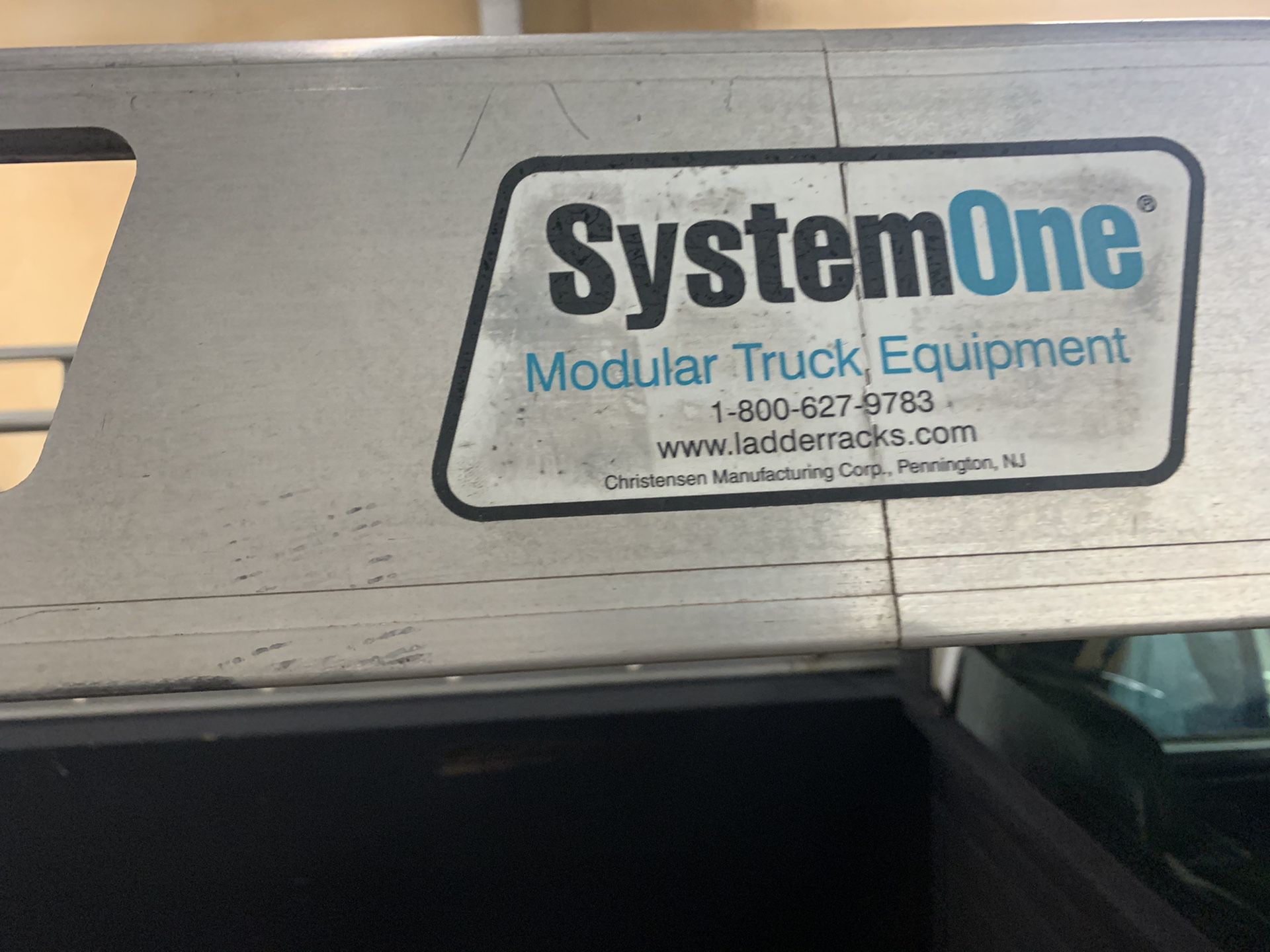 System one ladder rack with ratchet tie downs