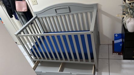 Gray Baby Crib with Storage Drawers