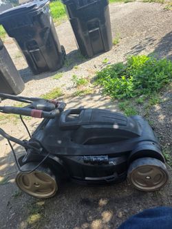 Electric mower with cord and blower