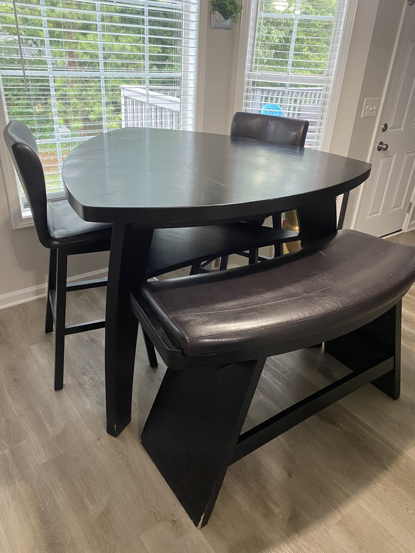 Rooms To Go Noah Chocolate 4 Piece Height Dining Set With 2 Chocolate Height Benches And One Curves Bench for Sale in Jonesboro GA OfferUp