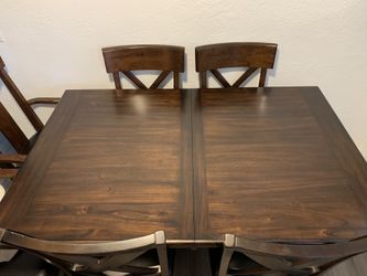 Bayside Furnishings - Wood dining room table