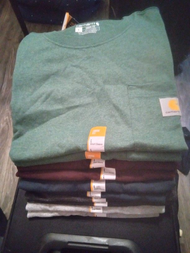 10 Large Carhartt Shirts.