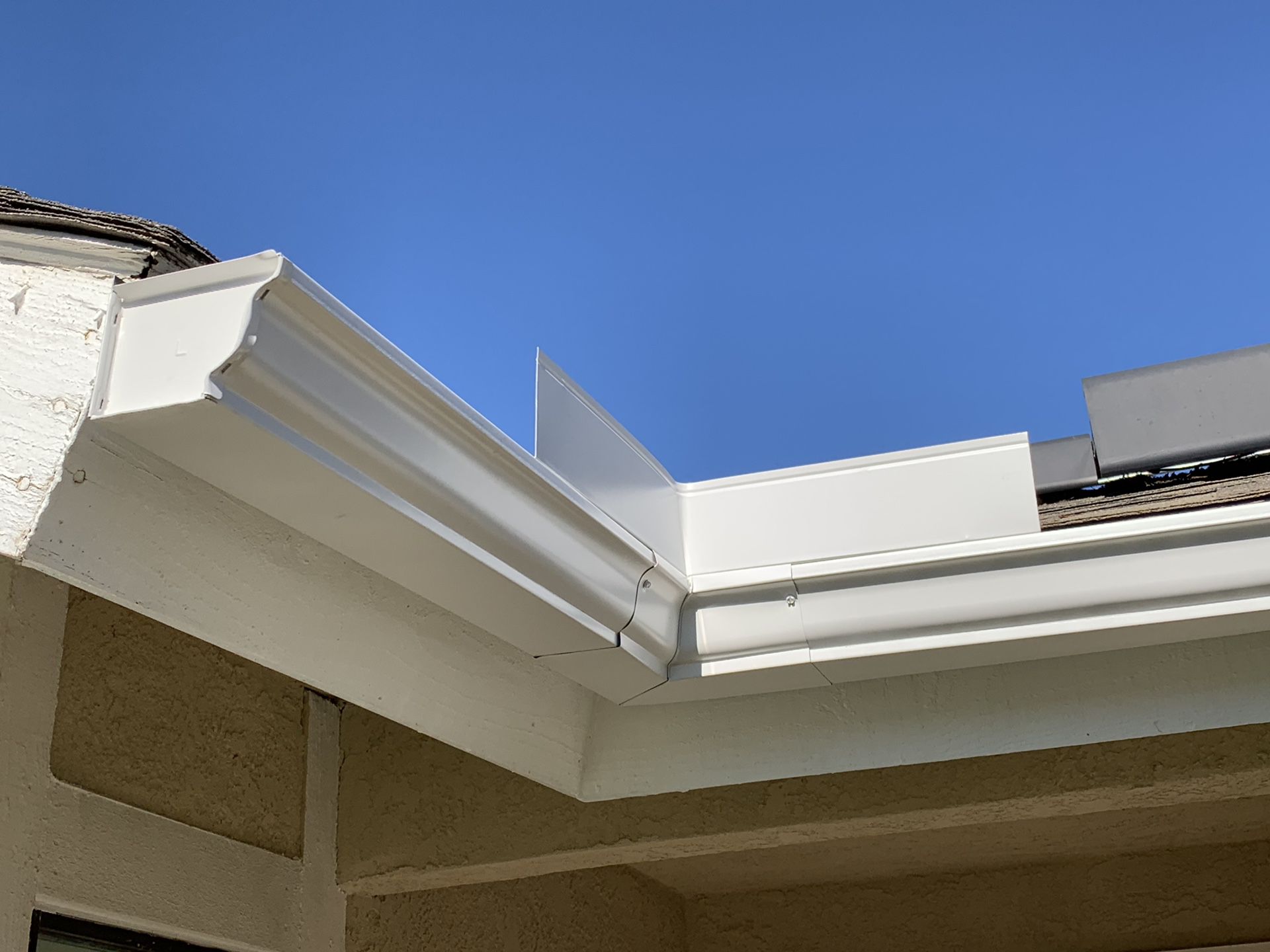 Rain Gutters and Downspouts