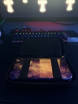 Nintendow New 3DS XL Galaxy Edition with Case and Charger