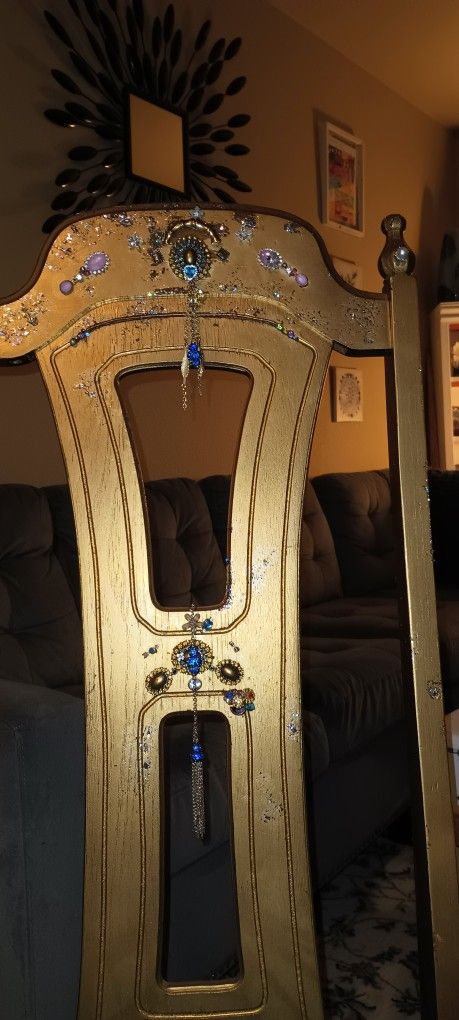 One Of A Kind Chair. A Shiny Matt Gold With Soft Blue Cushion.