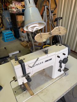 Singer 20U73 Industrial Sewing Machine needs to be serviced