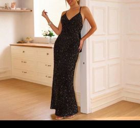 Black sequined floor -length evening gown