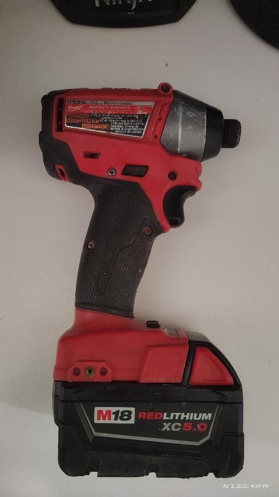 MILWAUKEE M18 FUEL IMPACT DRIVER 3 SPEED MODE WITH 5.0 BATTERY WORKING GOOD PRICE TO SELL FAST $65 PICK UP IN RIVERSIDE