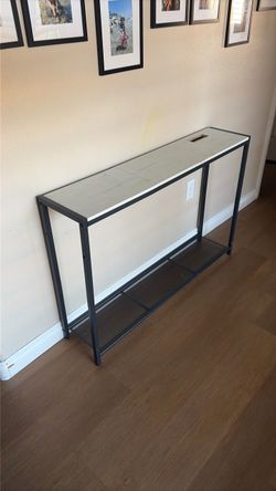 Thin metal table