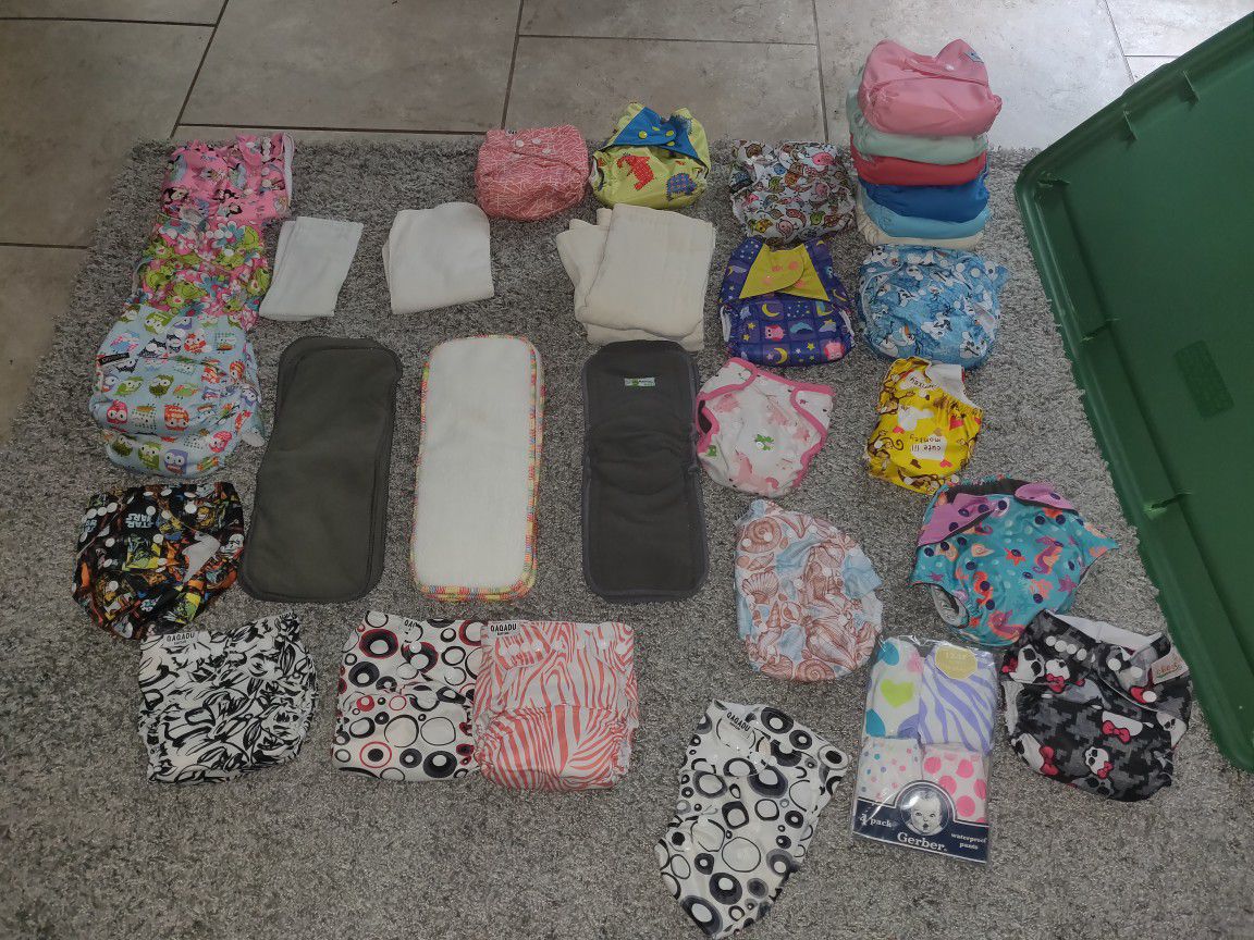 Cloth diapers with inserts