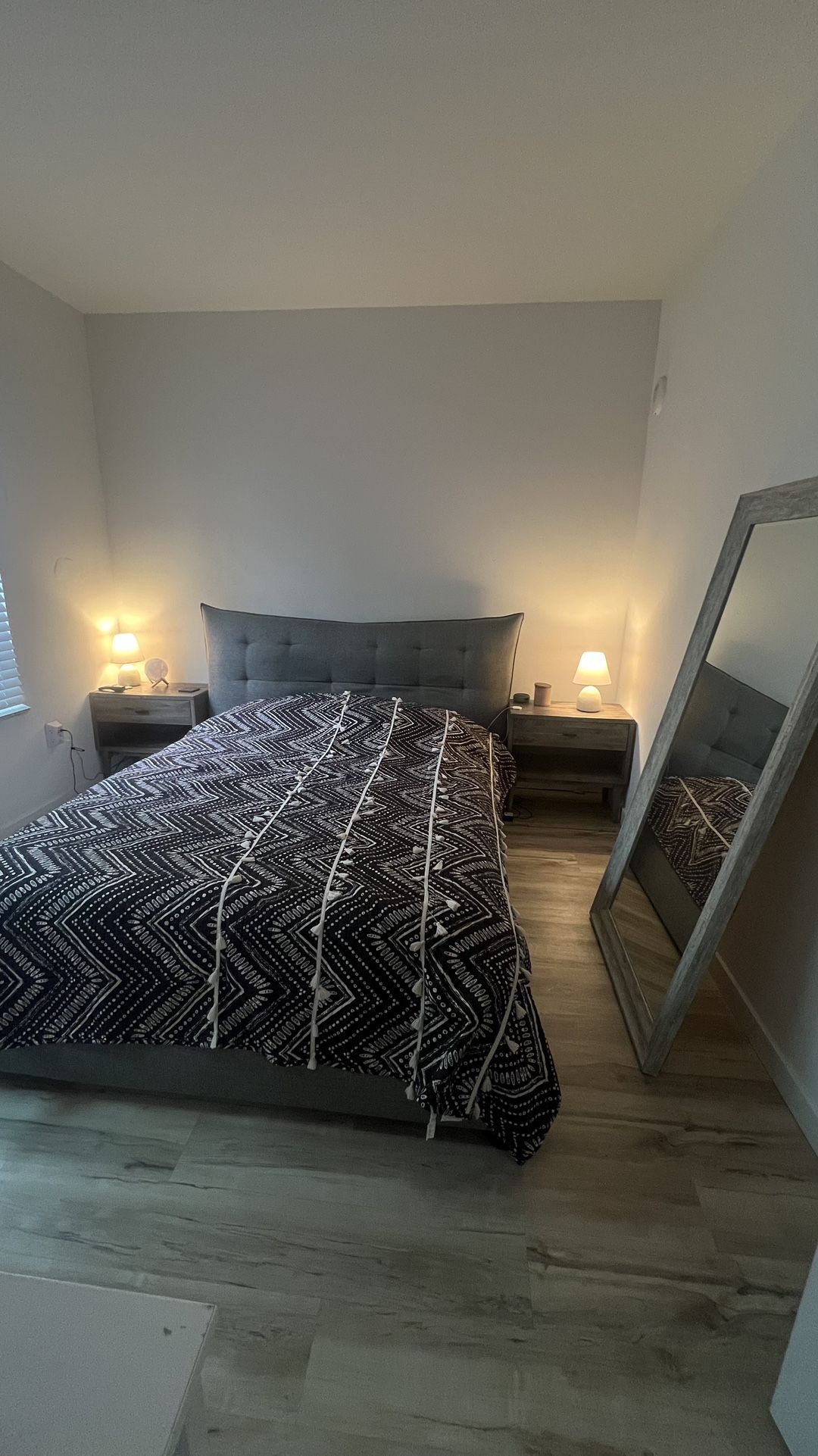 Queen bed / Mattress / 65” LG TV / Mirror / Nightstands