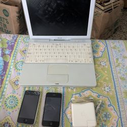 IBook Mac Computer + Charger,  2 Old iPhones.  