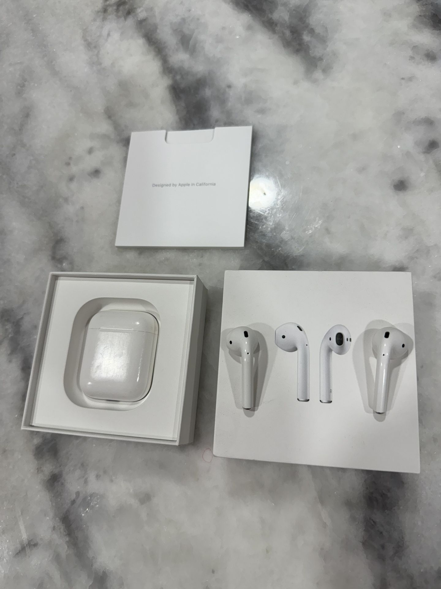 Apple Airpods Wireless Bluetooth Headphones with Charging Case