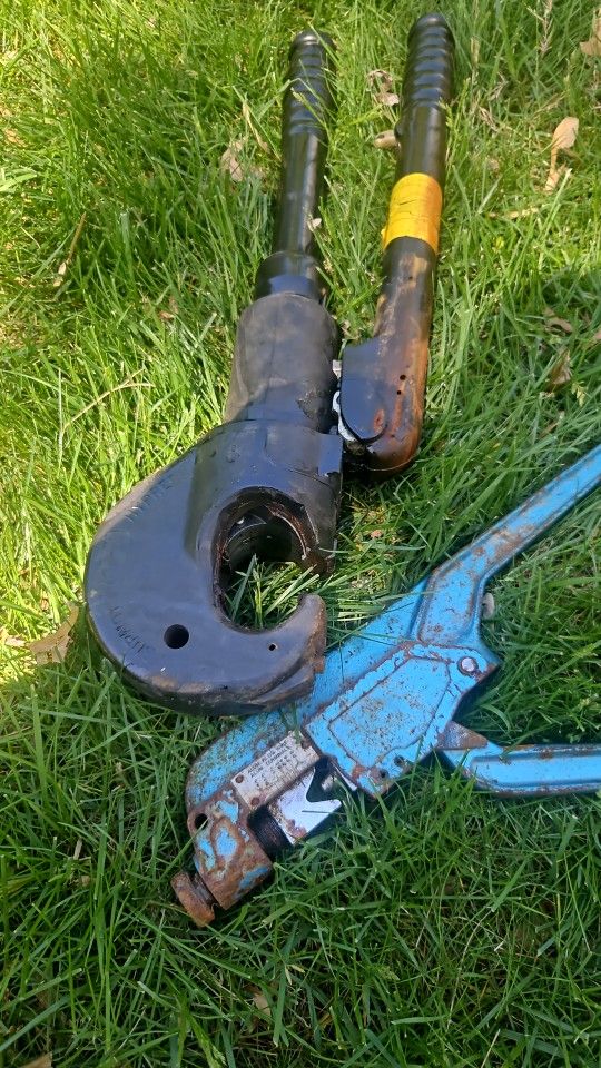 The tool shown in the image is a manual hydraulic crimper, specifically the Huskie Tools TEP-410 model. This tool is used to compress or press connect