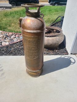 Vintage copper badgers Fire Extinguisher